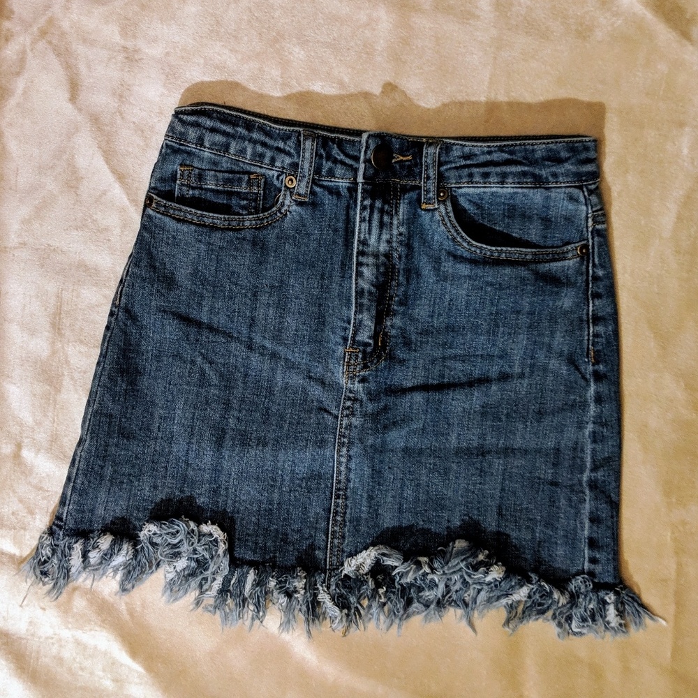 Denim skirt with frayed bottom